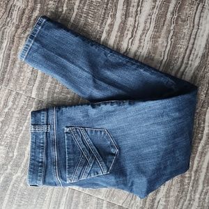 CAbi #636 mid rise skinny jeans